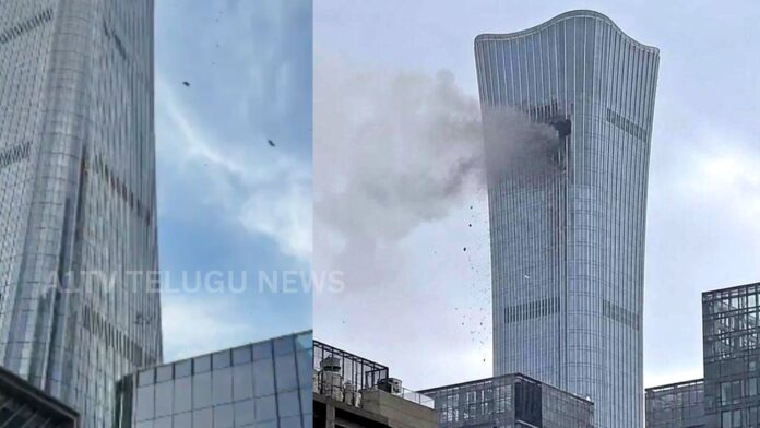 small aircraft crashes into citic tower in beijing
